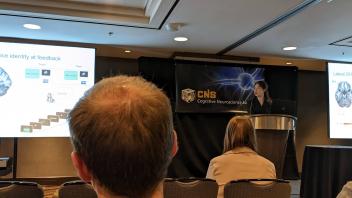 Lily giving a talk at CNS 2022